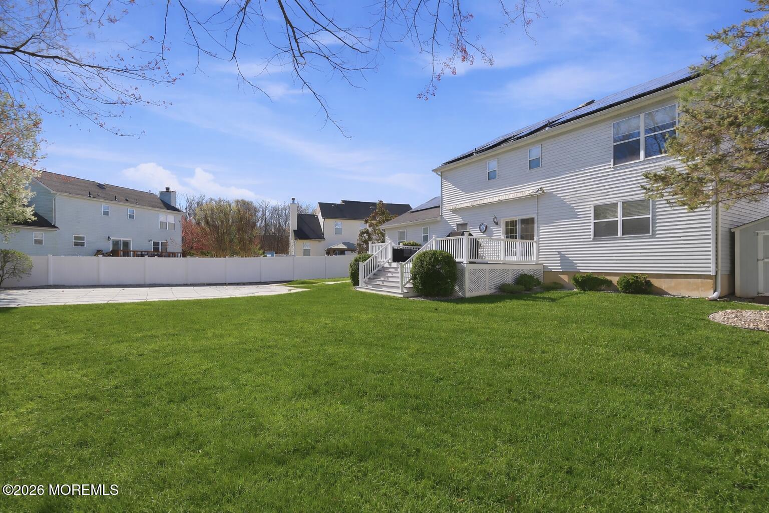 23 Paulette Lane Howell, NJ 07731 - Photo 10 of 35 a view of a house with a backyard
