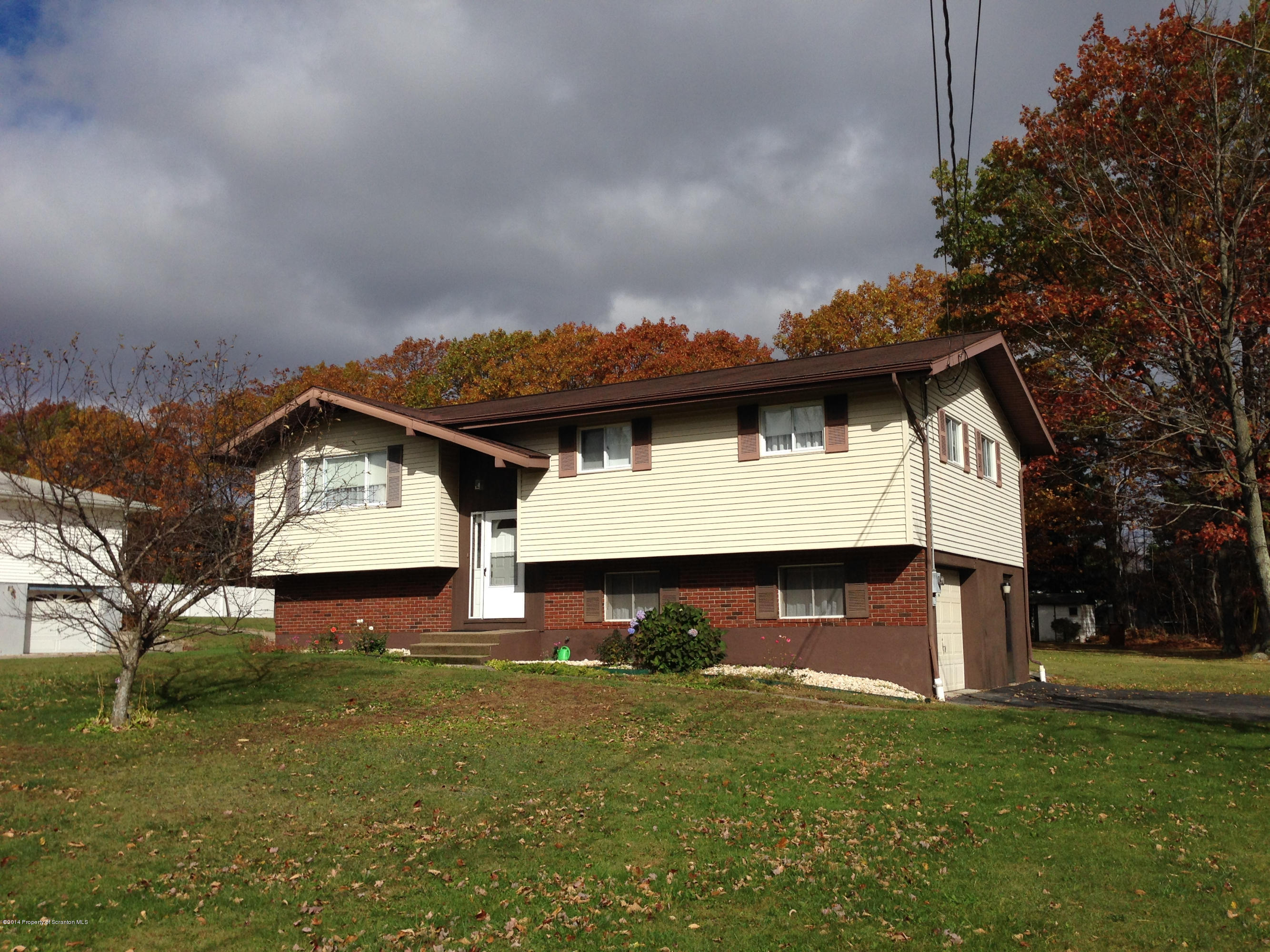 810 Lions Road Lake Ariel, PA 18436 - Photo 1 of 33 a view of a house with a yard