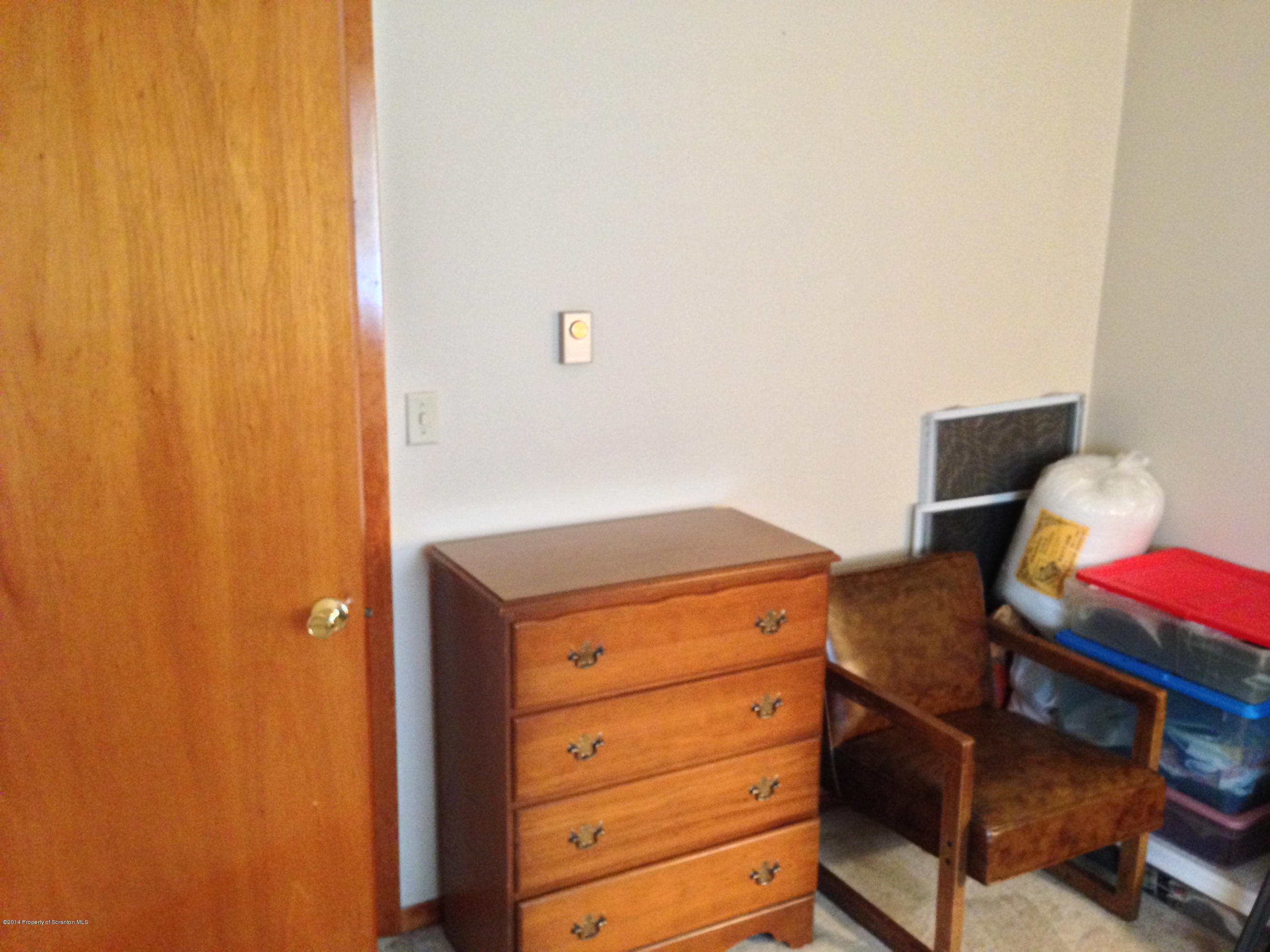 810 Lions Road Lake Ariel, PA 18436 - Photo 26 of 33 a view of a dresser with wooden floor