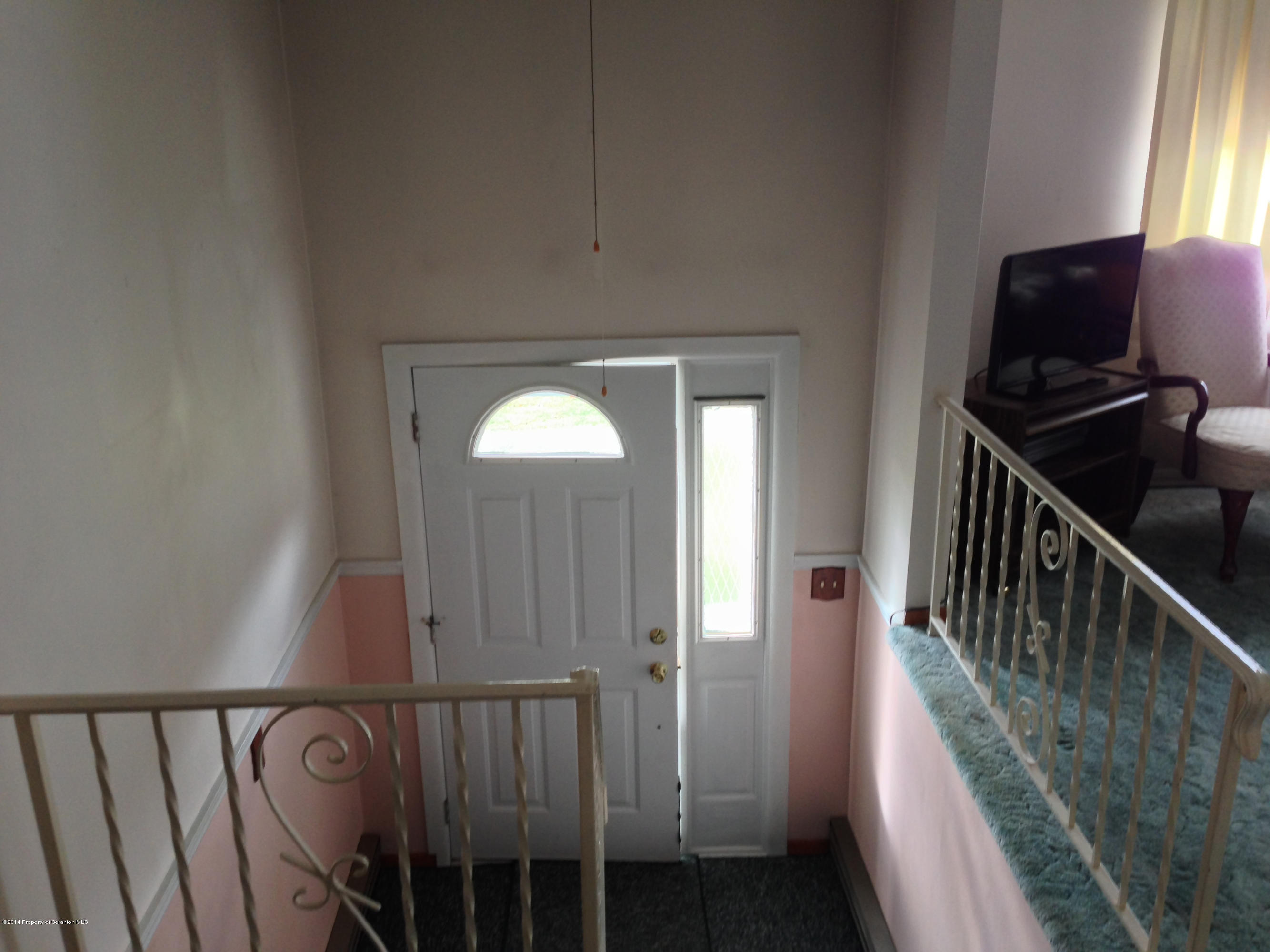 810 Lions Road Lake Ariel, PA 18436 - Photo 28 of 33 a view of a hallway with wooden floor and staircase