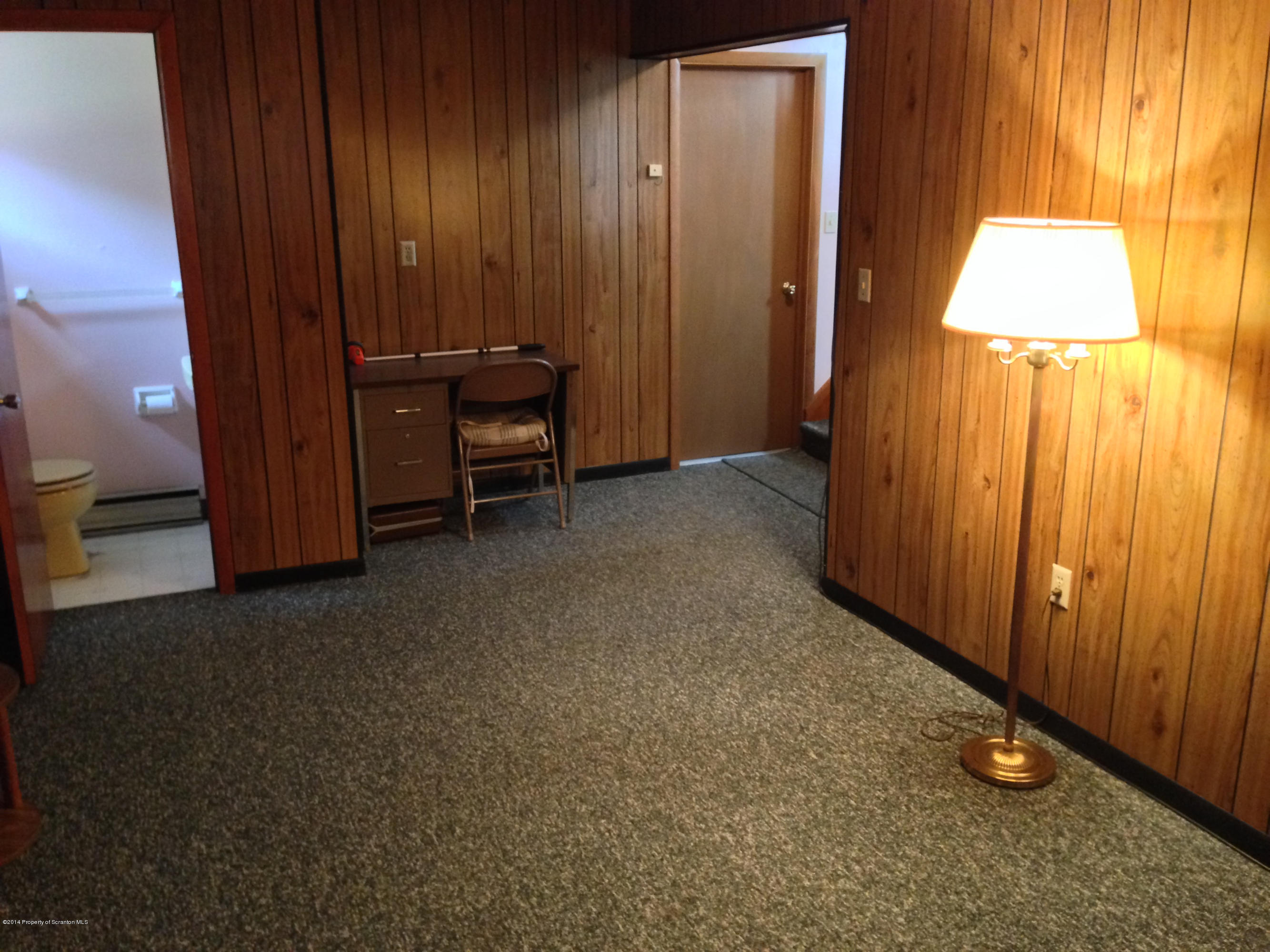 810 Lions Road Lake Ariel, PA 18436 - Photo 7 of 33 an empty room with furniture and a window