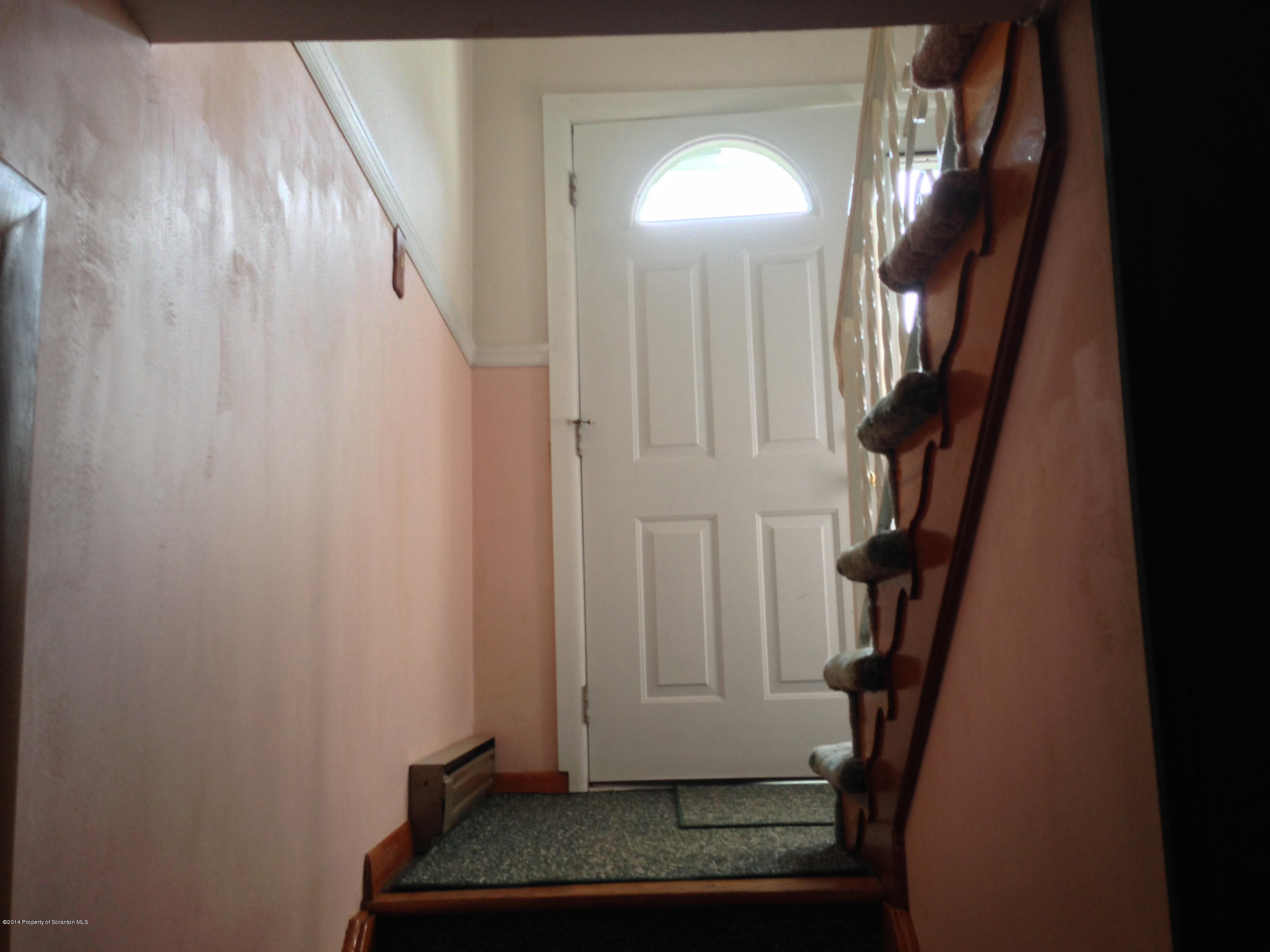 810 Lions Road Lake Ariel, PA 18436 - Photo 10 of 33 a view of staircase with wooden floor and cabinets