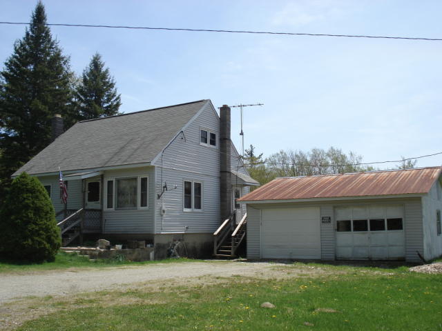 126 Main Road Monroe, MA 01247 - Photo 1 of 1 a view of a house with a yard