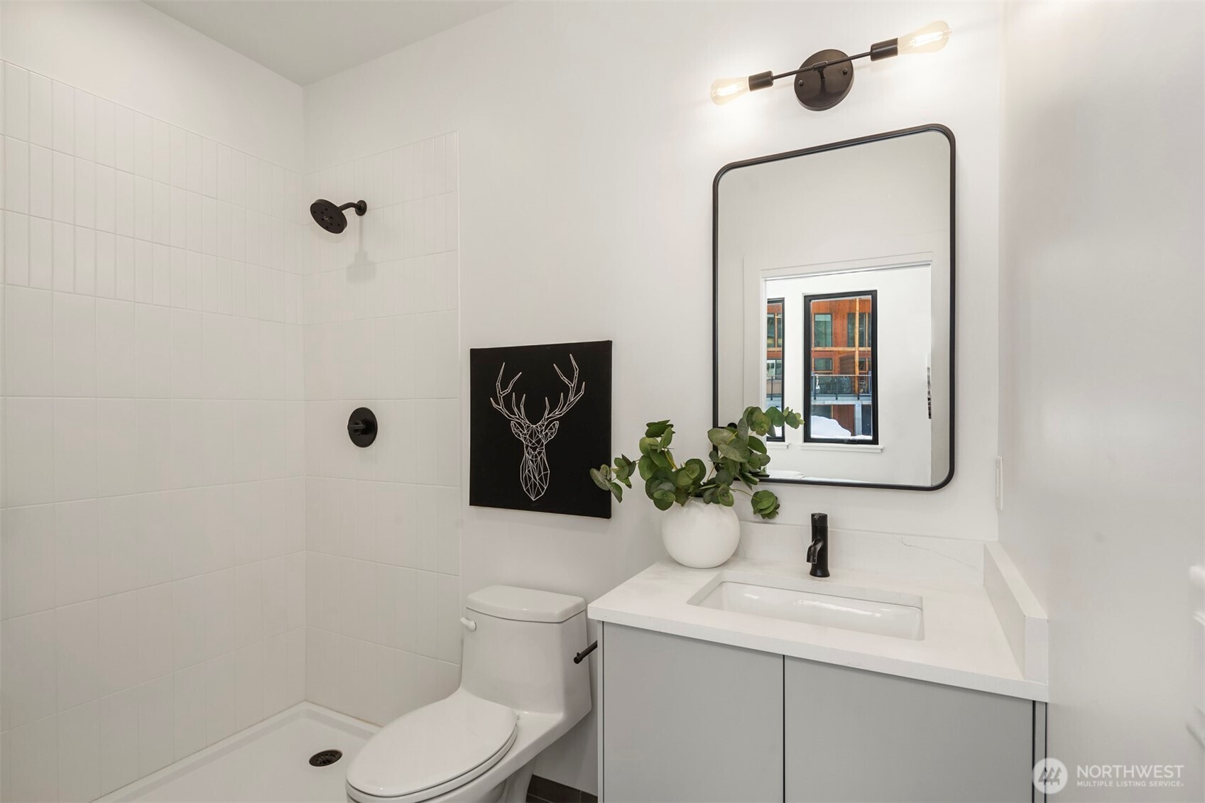 101 Pass Life Way Snoqualmie Pass, WA 98068 - Photo 14 of 24 a bathroom with a toilet sink vanity granite and mirror