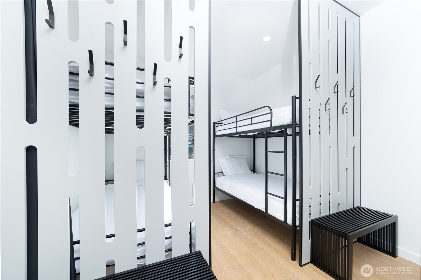 101 Pass Life Way Snoqualmie Pass, WA 98068 - Photo 17 of 24 a view of a hallway with wooden floor and staircase