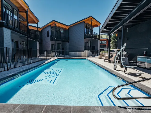 a front view of a house with swimming pool
