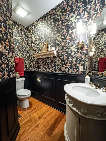 a bed room with furniture and a chandelier