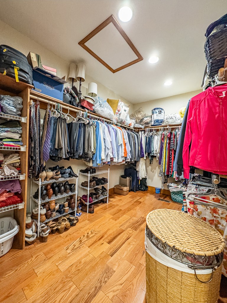 59 Cabin Run Lane Murphy, NC 28906 - Photo 18 of 82 a view of walk in closet with clothes