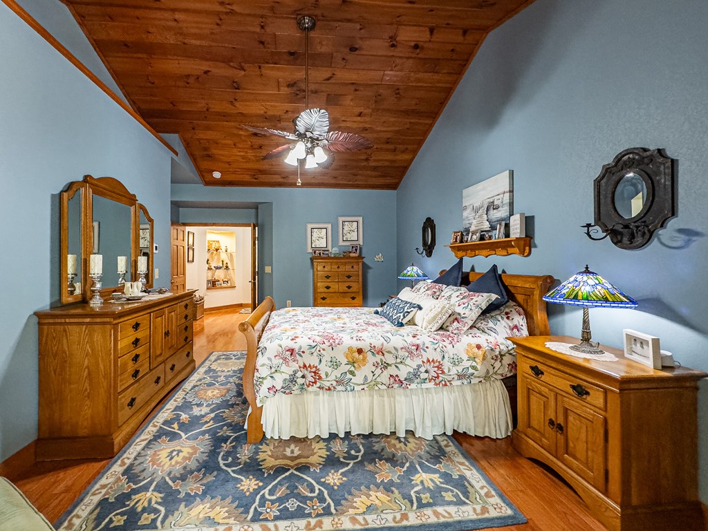 59 Cabin Run Lane Murphy, NC 28906 - Photo 26 of 82 a bed room with furniture and a chandelier