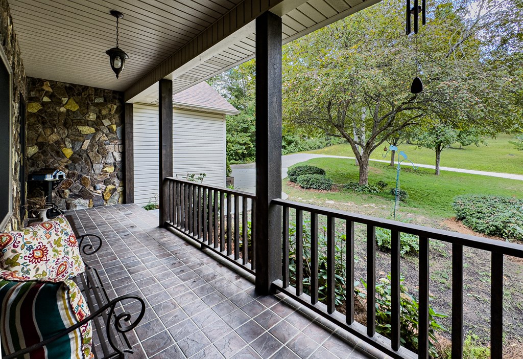 59 Cabin Run Lane Murphy, NC 28906 - Photo 3 of 82 a view of a porch with wooden floor in front of a house