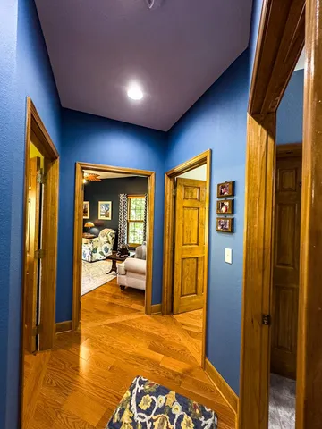 a large kitchen with a table and chairs