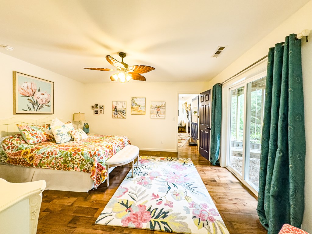 59 Cabin Run Lane Murphy, NC 28906 - Photo 64 of 82 a bed room with a bed and a chandelier