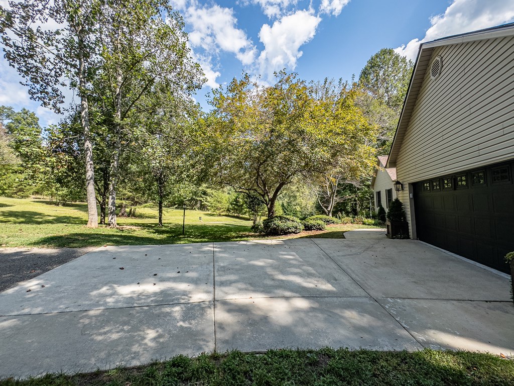 59 Cabin Run Lane Murphy, NC 28906 - Photo 78 of 82 a view of a house with a yard and tree s