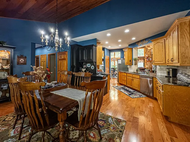 a bathroom with a sink toilet and a mirror