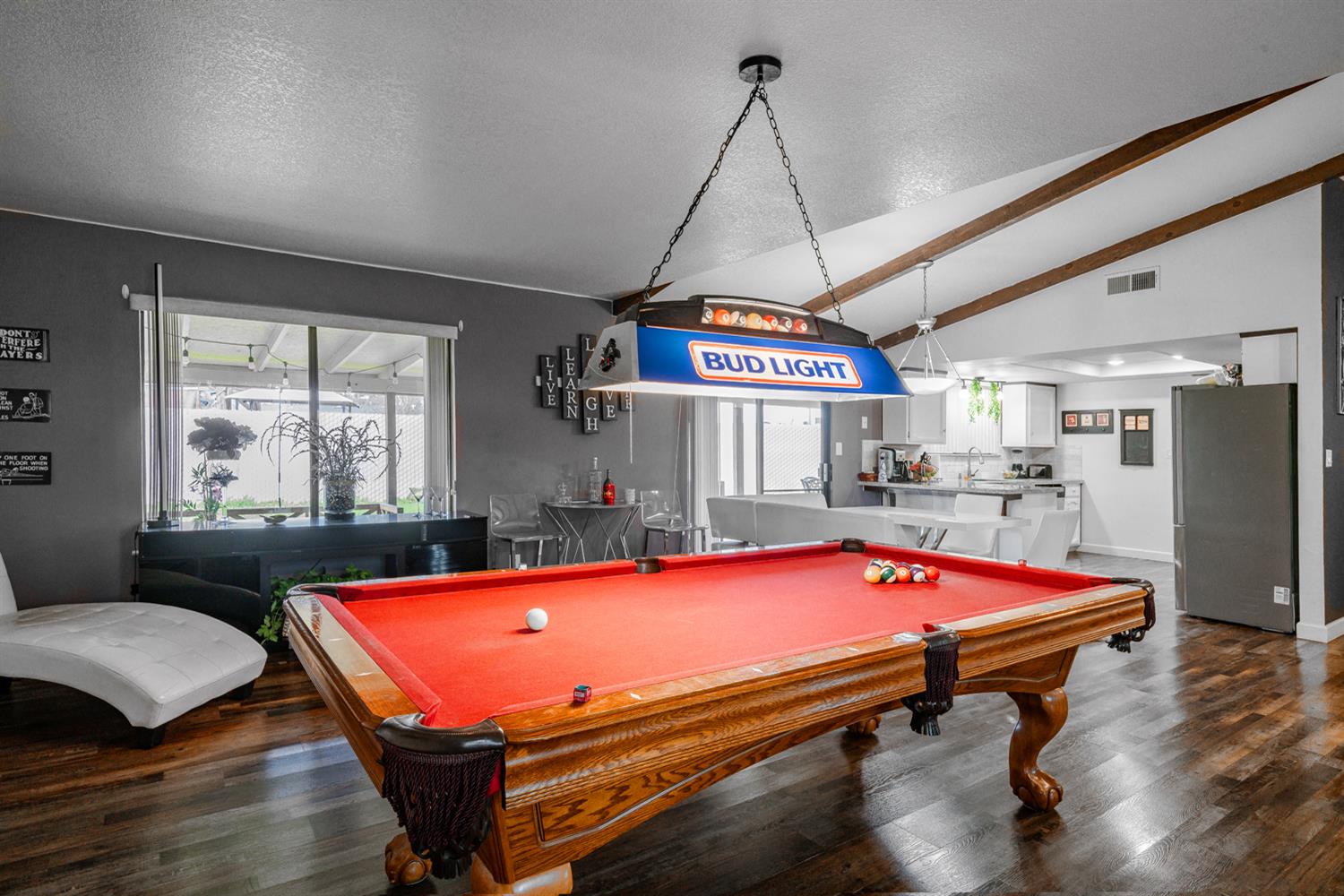 16026 Karen Road Madera, CA 93636 - Photo 22 of 38 a room with pool table and windows