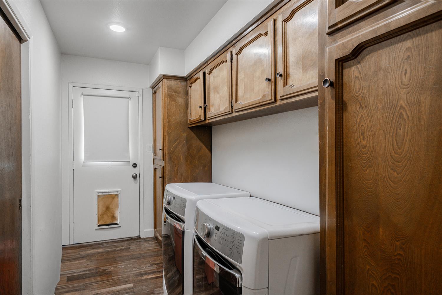 16026 Karen Road Madera, CA 93636 - Photo 29 of 38 a utility room with dryer and washer
