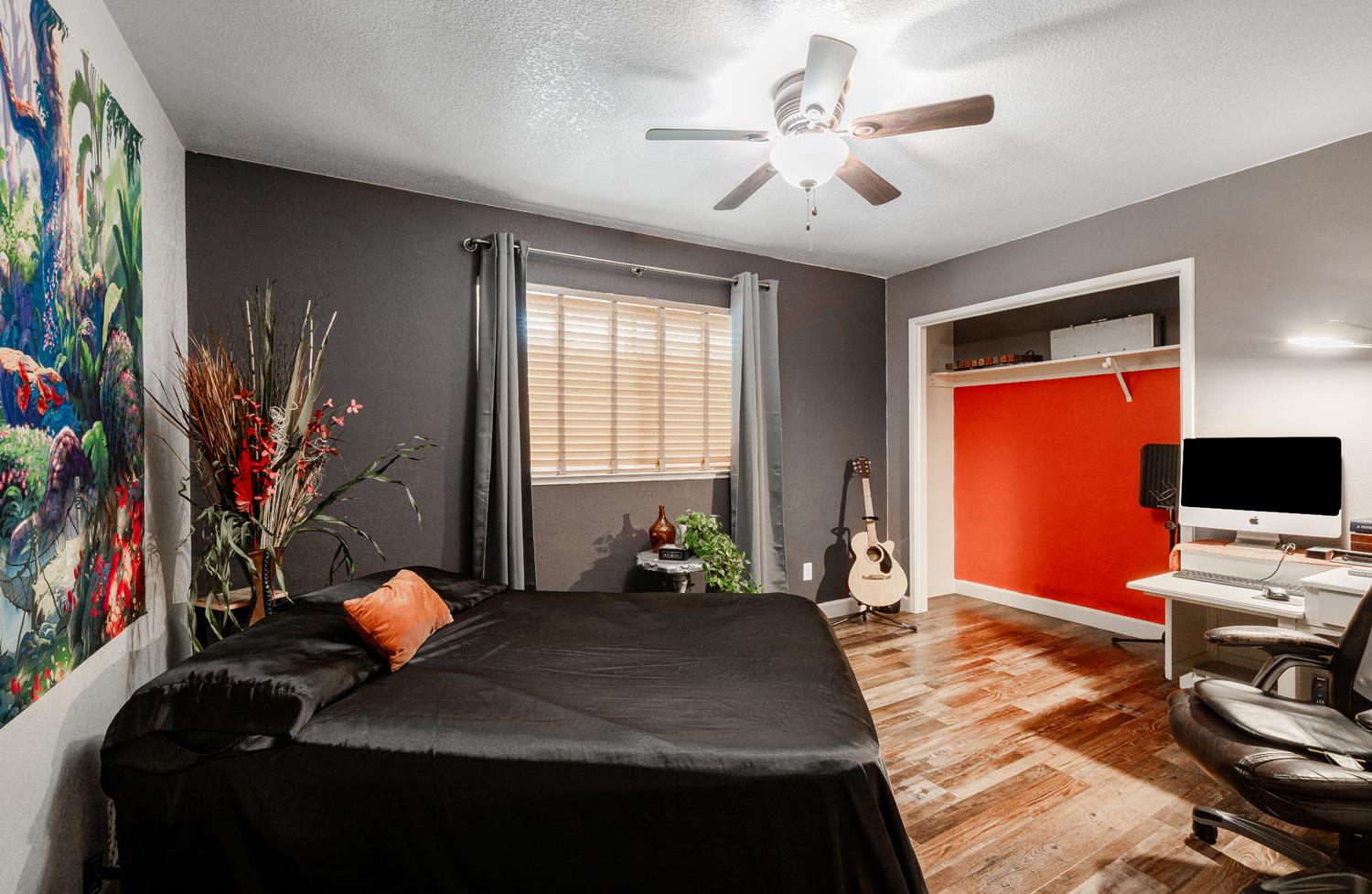 16026 Karen Road Madera, CA 93636 - Photo 31 of 38 a bedroom with a bed and a chandelier