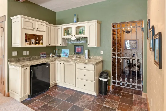 a bedroom with a bed and a balcony