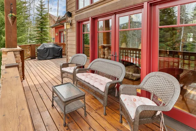 a bathroom with double sink and a mirror
