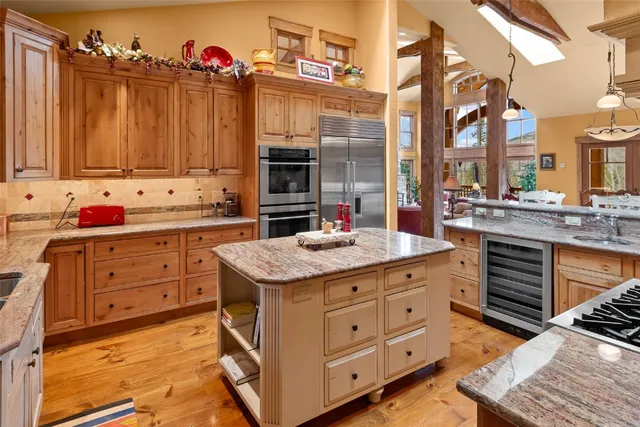 a outdoor living room with furniture and a window