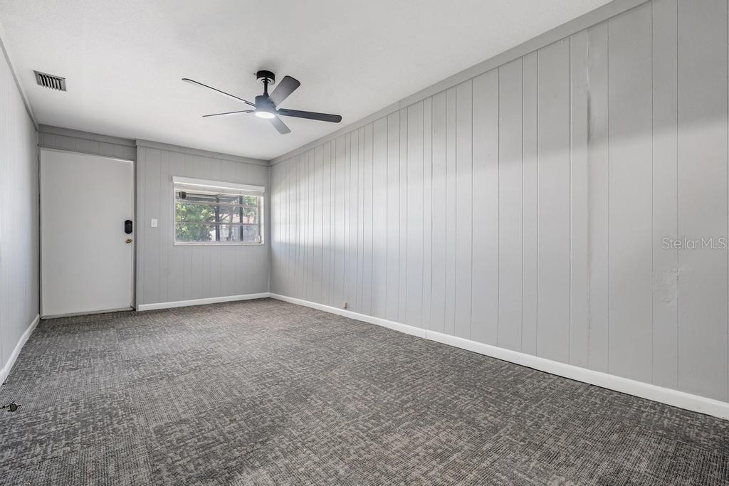 2709 West Abdella Street Tampa, FL 33607 - Photo 14 of 29 a view of an empty room with a window