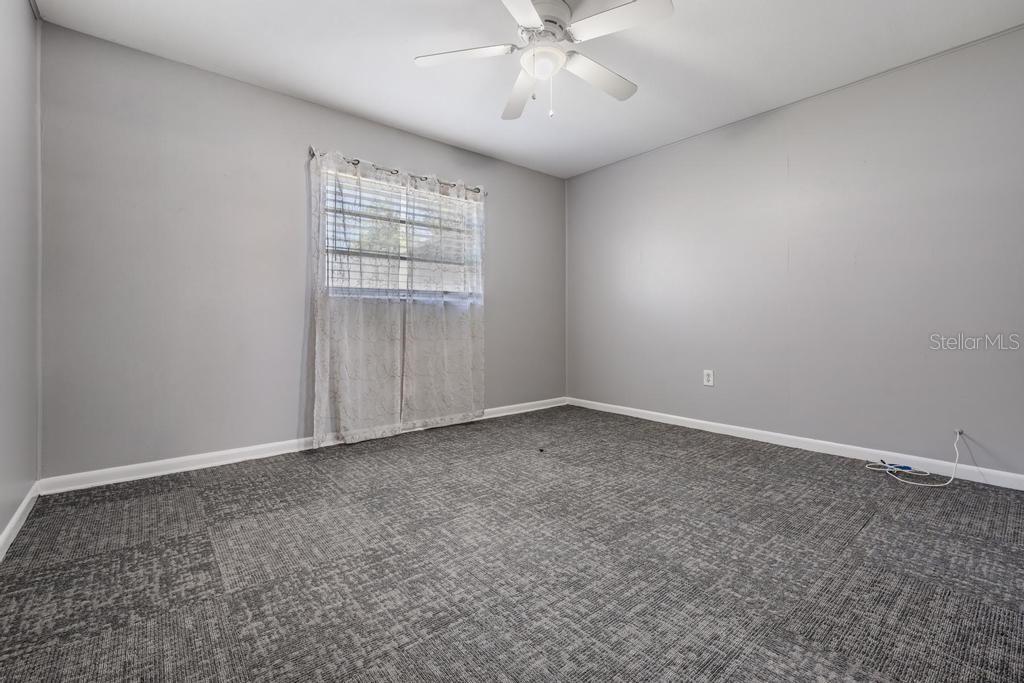 2709 West Abdella Street Tampa, FL 33607 - Photo 17 of 29 a view of an empty room with a window
