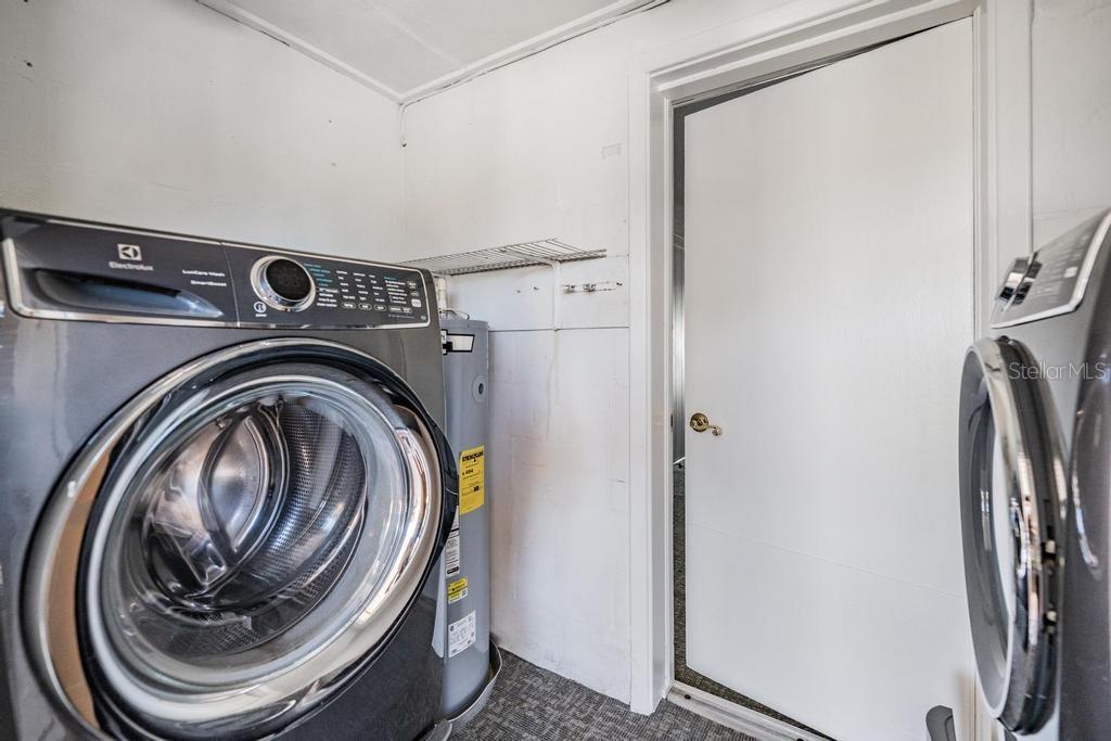 2709 West Abdella Street Tampa, FL 33607 - Photo 20 of 29 a utility room with dryer and washer