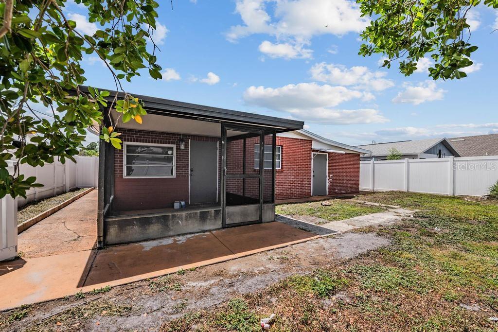 2709 West Abdella Street Tampa, FL 33607 - Photo 22 of 29 a house view with a backyard space
