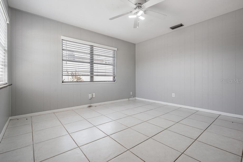 2709 West Abdella Street Tampa, FL 33607 - Photo 9 of 29 a view of an empty room with a window