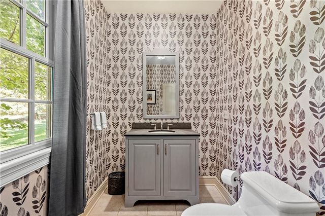 a room with furniture and flat screen tv