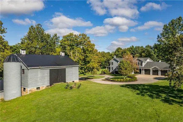 a view of a house with a yard
