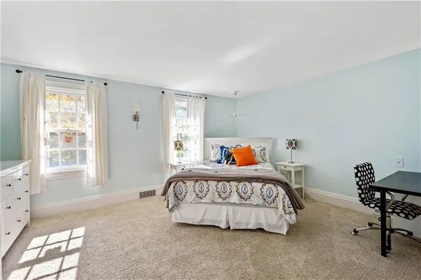 a bathroom with a sink a vanity and a mirror