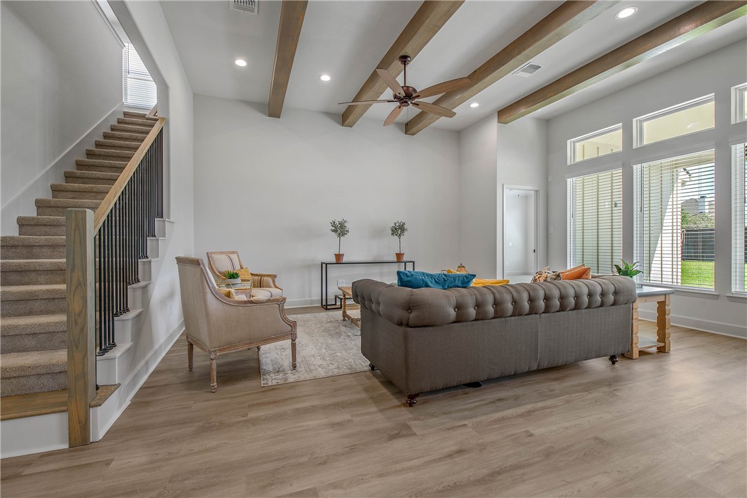 5010 Acadia Loop Bryan, TX 77802 - Photo 11 of 21 a living room with furniture and a piano