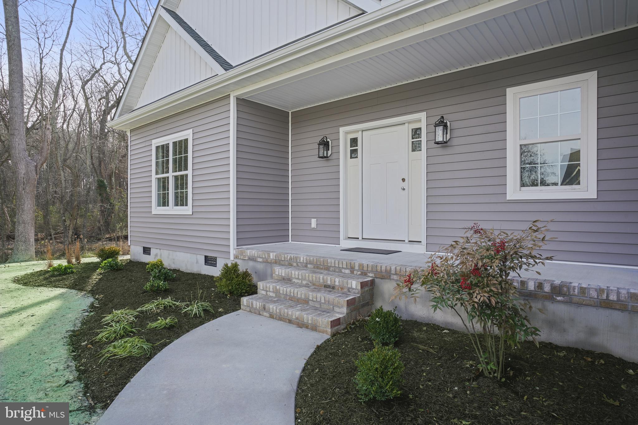 32 Decatur Street Berlin, MD 21811 - Photo 8 of 44 Concrete front porch with brick trim