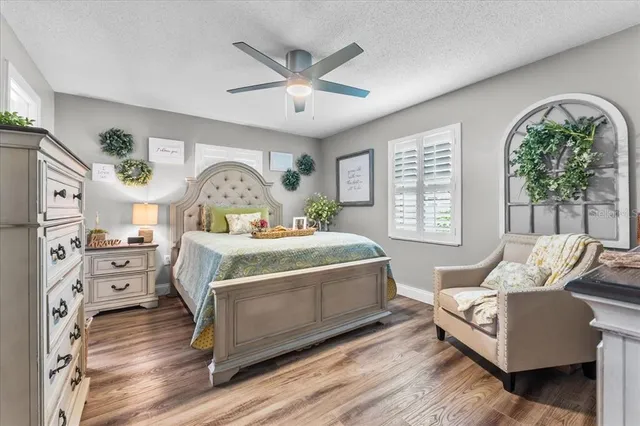 a bedroom with a bed and furniture