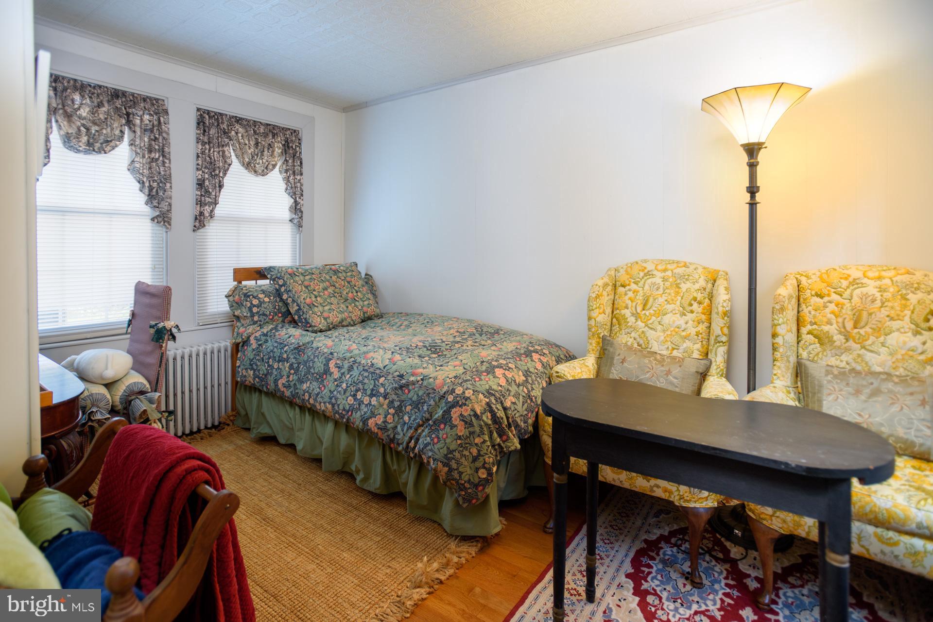 1308 Town Point Road Cambridge, MD 21613 - Photo 16 of 61 a bedroom with a bed and a window