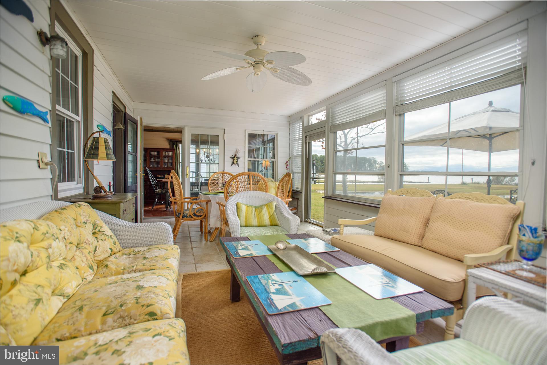 1308 Town Point Road Cambridge, MD 21613 - Photo 23 of 61 a living room with furniture and a large window