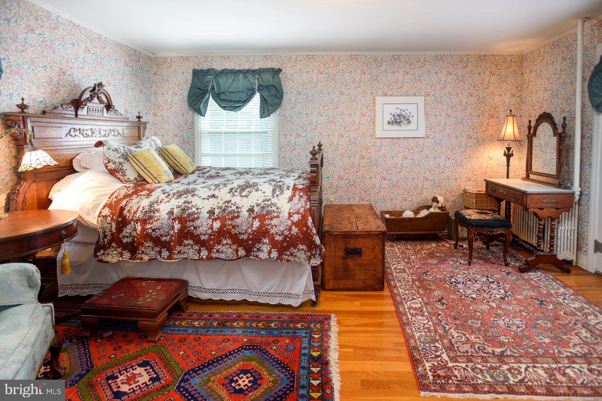 1308 Town Point Road Cambridge, MD 21613 - Photo 28 of 61 a bedroom with bed and a window