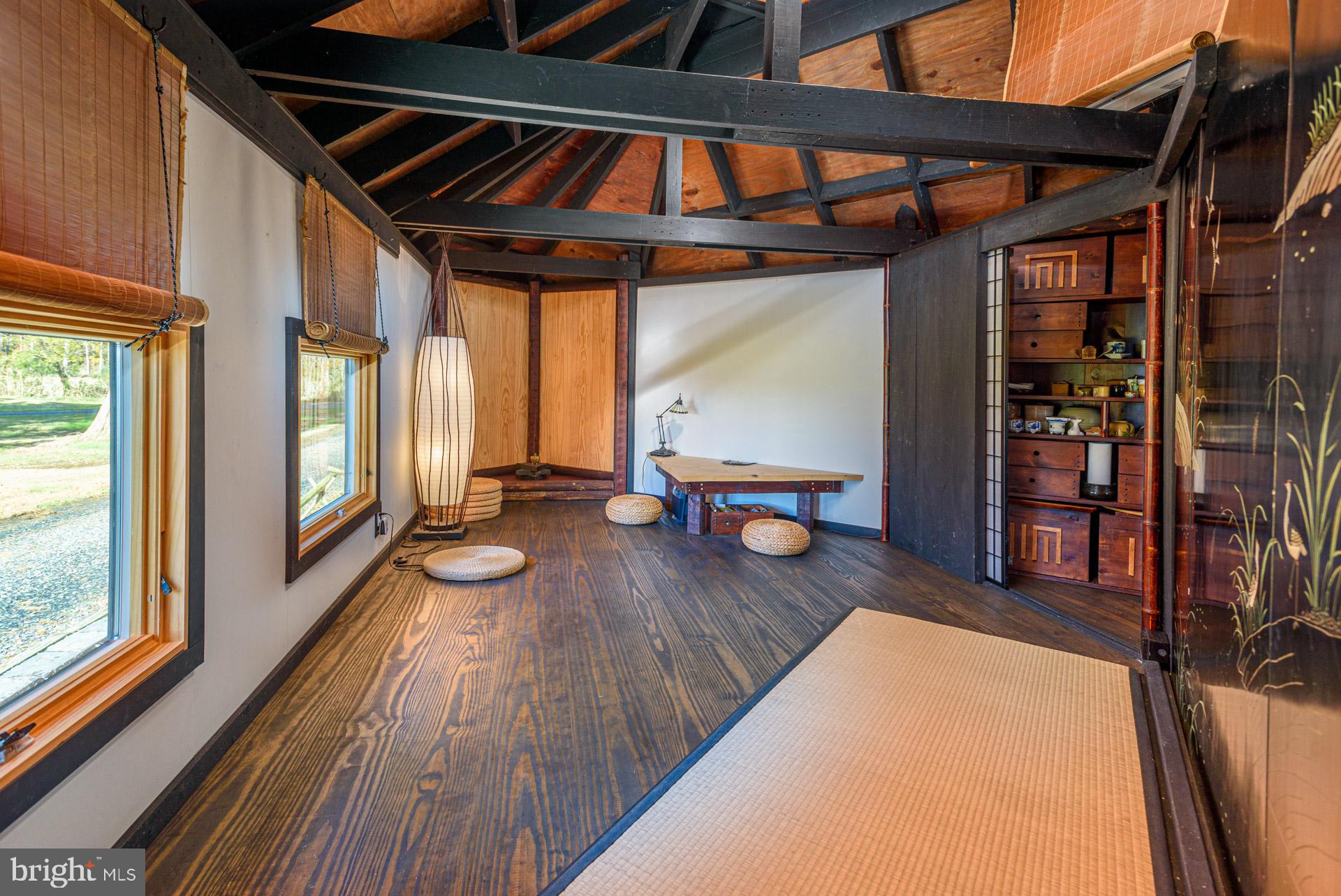 1308 Town Point Road Cambridge, MD 21613 - Photo 34 of 61 a view of a living room with furniture and wooden floor