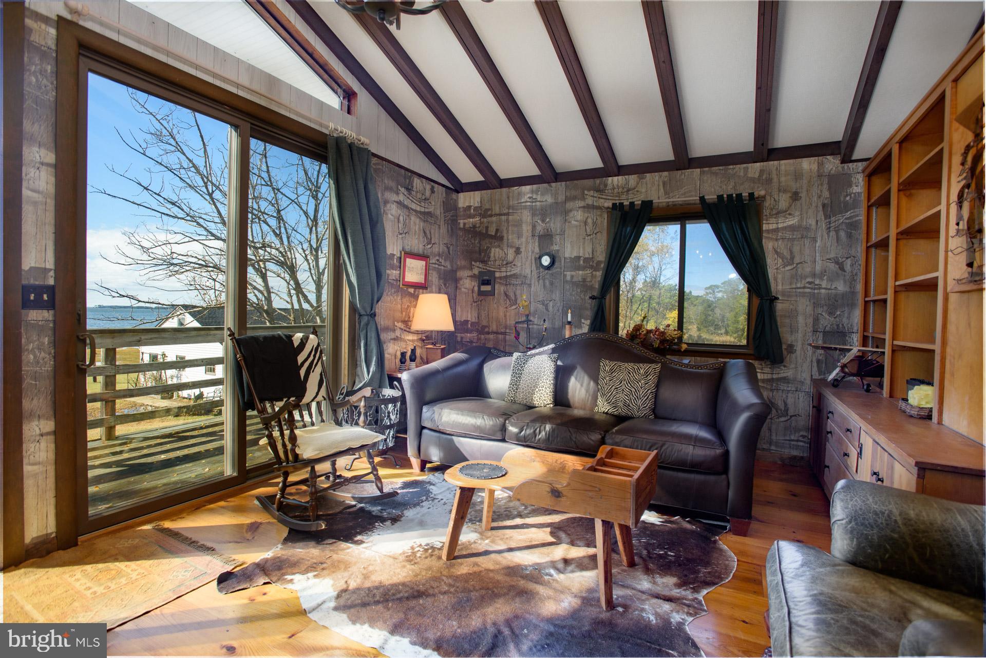 1308 Town Point Road Cambridge, MD 21613 - Photo 37 of 61 a living room filled with furniture