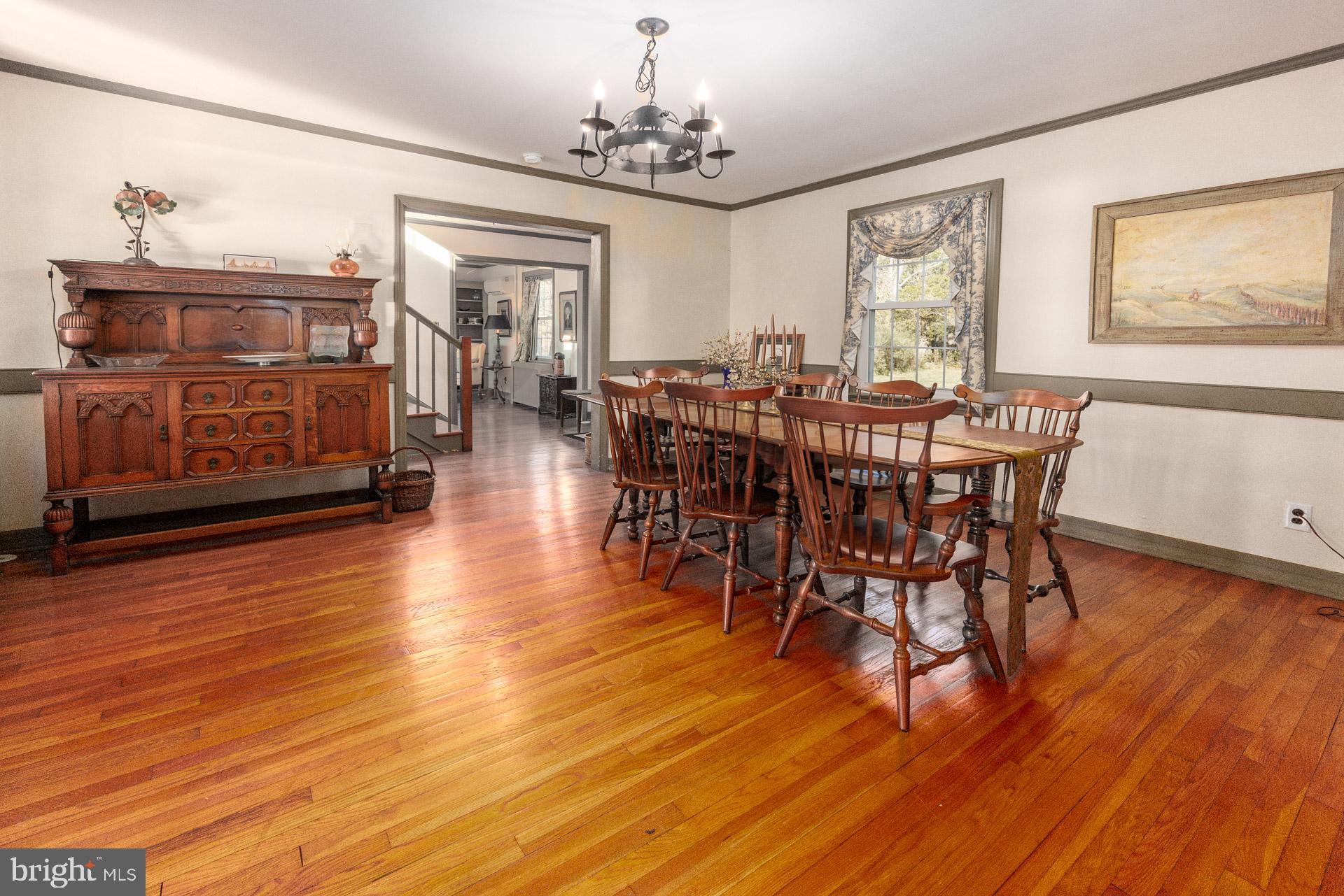 1308 Town Point Road Cambridge, MD 21613 - Photo 56 of 61 a view of a dining room with furniture window and wooden floor