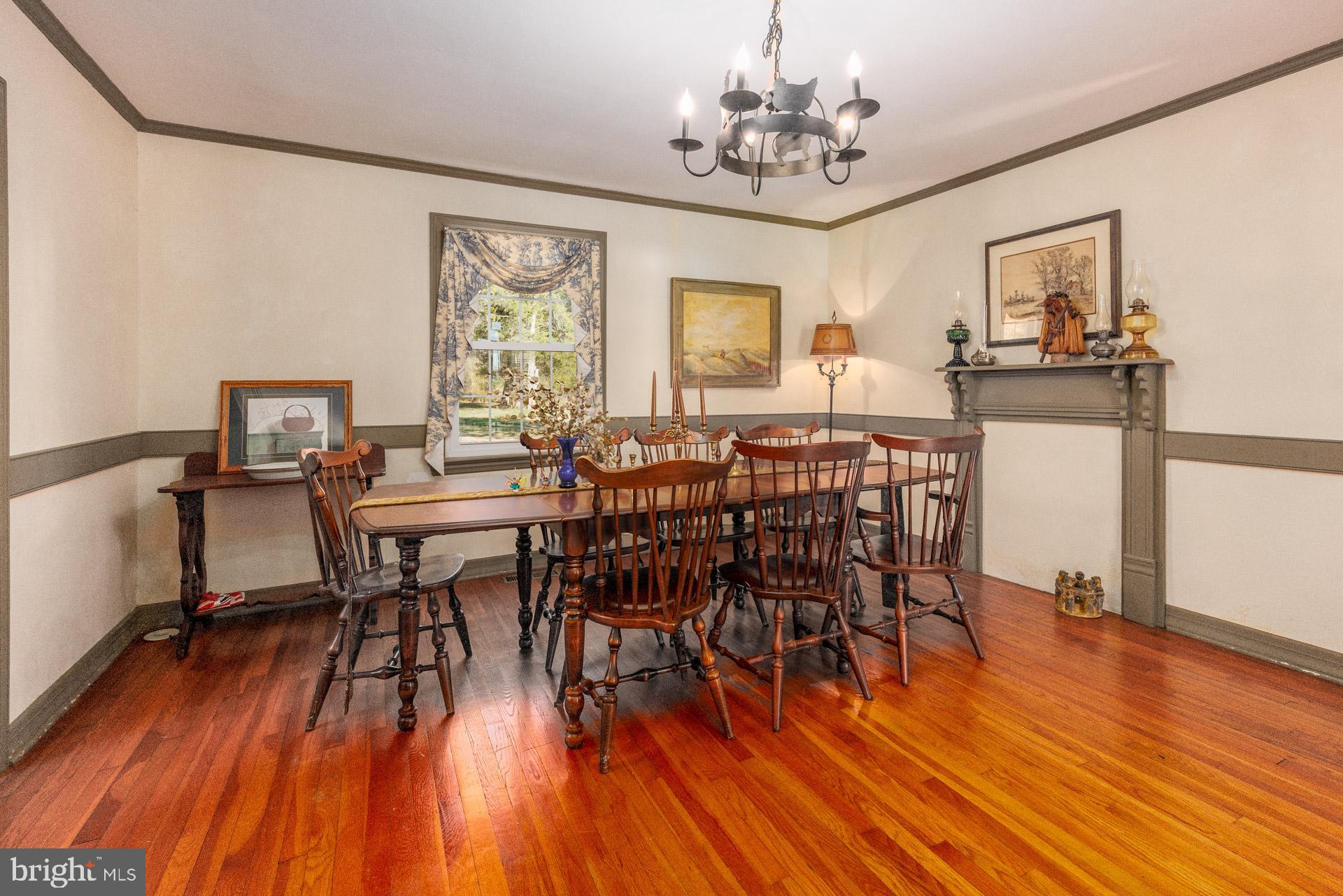1308 Town Point Road Cambridge, MD 21613 - Photo 57 of 61 a view of a dining room with furniture window and wooden floor