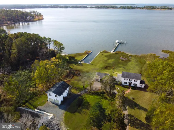 a view of swimming pool with outdoor seating and yard