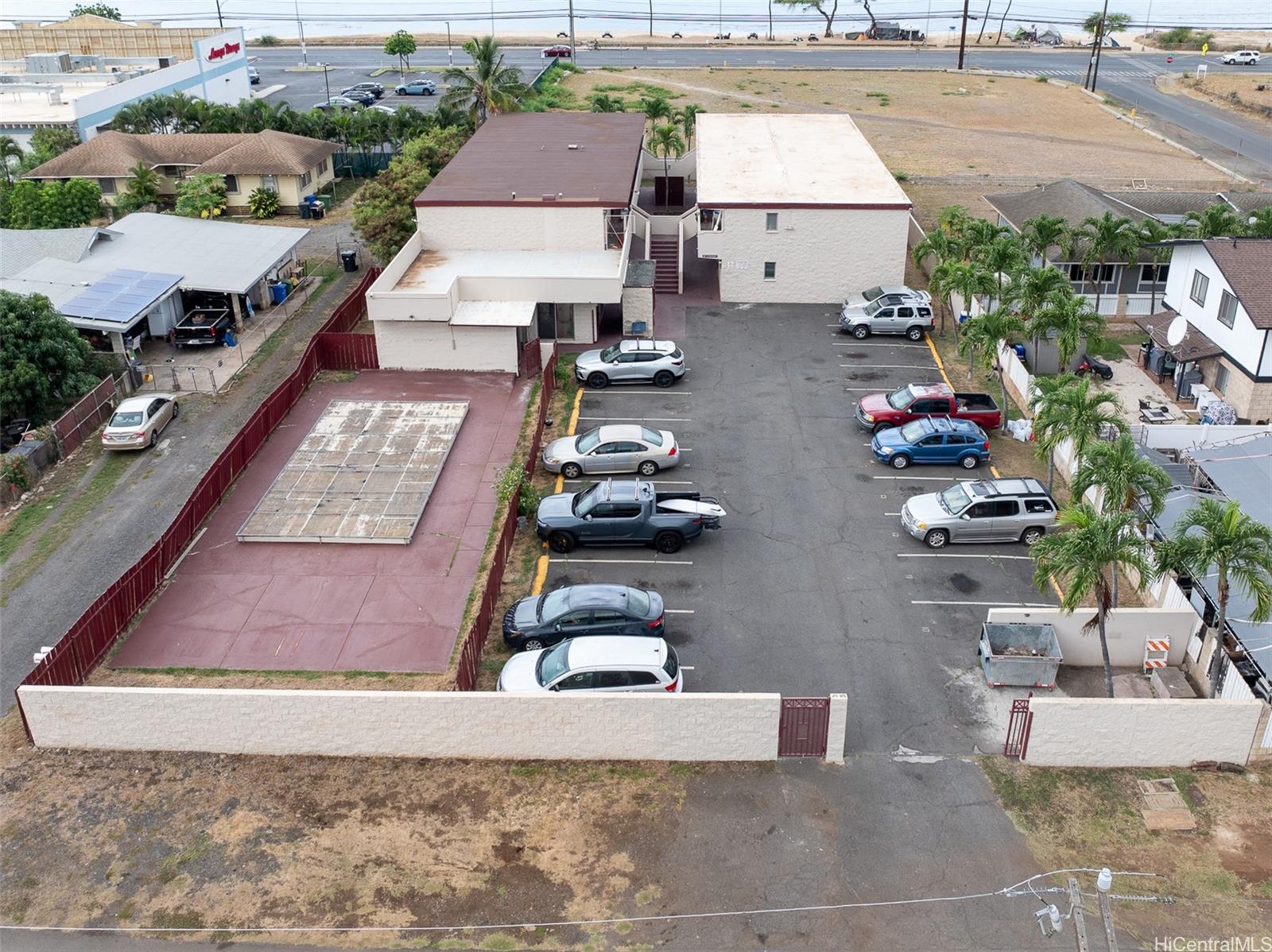 an aerial view of a house with swimming pool