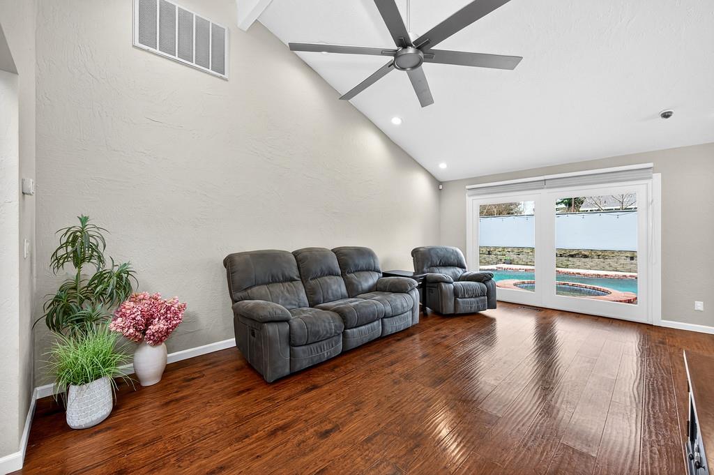4337 Bannister Road Fair Oaks, CA 95628 - Photo 11 of 35 a living room with furniture and a wooden floor