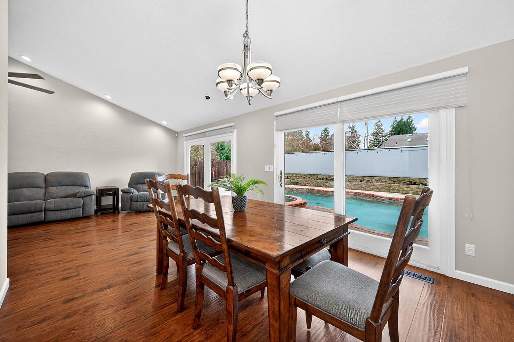 4337 Bannister Road Fair Oaks, CA 95628 - Photo 12 of 35 a view of a dining room with furniture window and wooden floor