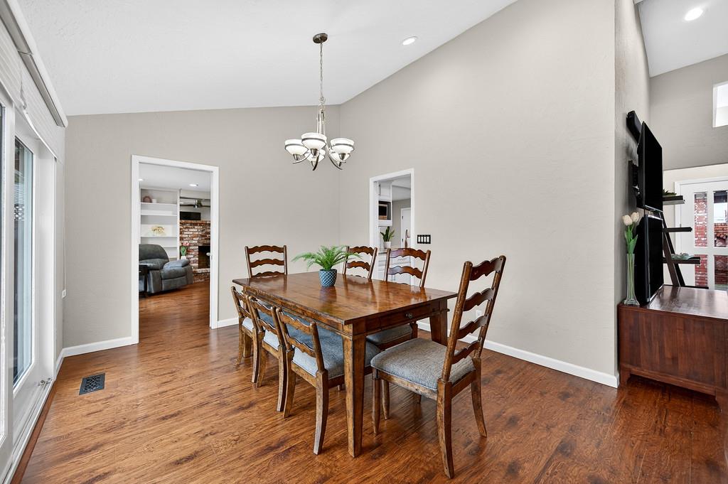 4337 Bannister Road Fair Oaks, CA 95628 - Photo 13 of 35 a view of a dining room with furniture and wooden floor