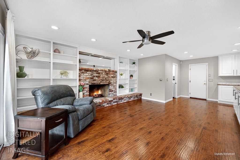 4337 Bannister Road Fair Oaks, CA 95628 - Photo 14 of 35 a living room with furniture and a fireplace