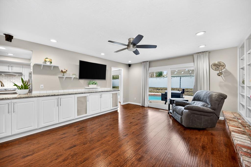 4337 Bannister Road Fair Oaks, CA 95628 - Photo 15 of 35 a living room with furniture and a flat screen tv