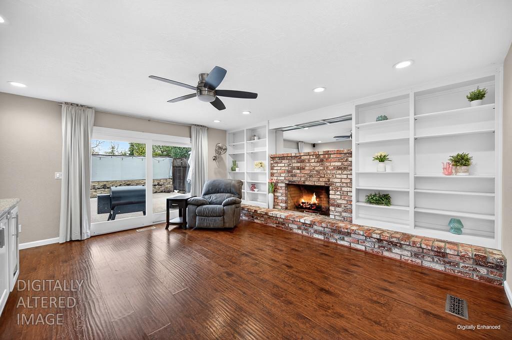 4337 Bannister Road Fair Oaks, CA 95628 - Photo 16 of 35 a living room with furniture and a fireplace